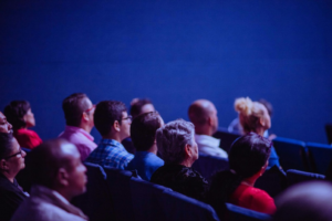 People sitting together in chairs 