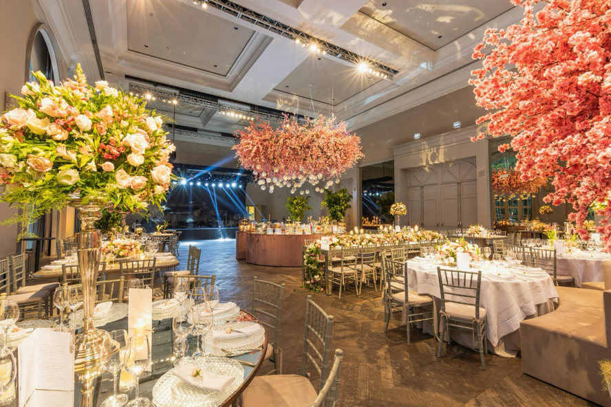 Small wedding venue transformed with elegant lighting design