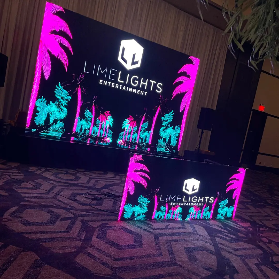 High-resolution indoor LED display screen rental set up for interactive video feeds at a Cleveland reception venue.
