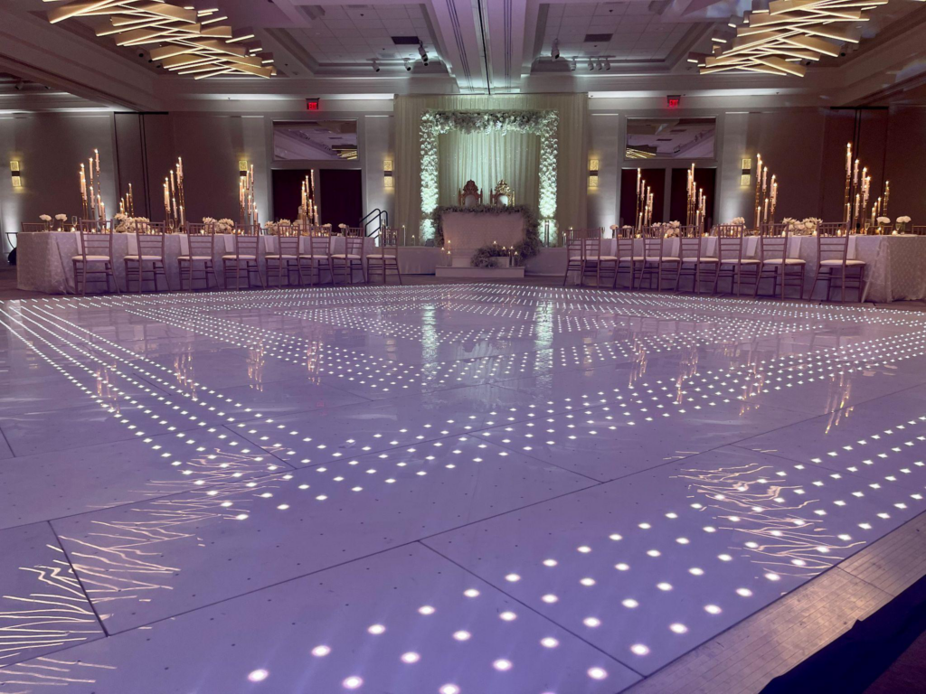 close-up of a dance floor with lights all over it